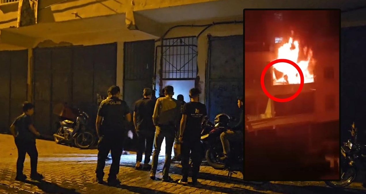 yanginda kalan cocugunu kurtarmak icin alevler arasina daldi 2rpWTuwh